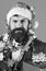 Christmas corporate party concept. Man in smart suit, Santa hat