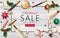 Christmas cosmetic sale 3d realistic web banner template. Female make up package New Year tree toy golden streamer frame