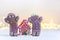 Christmas Couple Gingerbread men and gingerbread house on festive light background