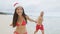 Christmas couple happy relaxing on beach travel