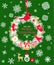 Christmas craft cut out wreath with conifer branches, cone, candy, mitten, sock, jingle bell, hanging redbird toy, angel and paper