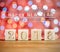 Christmas cubes. Ready card. Congratulations to the New year. The new year 2018. Blurred background.