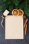 Christmas culinary background for menu or recipe. Blank paper with spice and fir branches