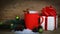 Christmas Cup and the Christmas gift on wooden background