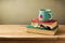 Christmas cup of tea and books on wooden table with copy space