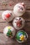 Christmas cupcakes closeup on a wooden table. vertical top view