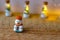 Christmas decor. A miniature figure of powdered sugar snowman with a orange hat