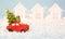 Christmas decor - red retro car on snow carries past white houses with lights garlands in bokeh Christmas tree with gift boxes on