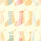 Christmas decor seamless colourful pattern. socks decor on a rainbow background.