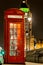 Christmas decorated classic phone box in Westminster, London