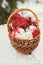 Christmas Decoration in basket against the background of a snow ladder