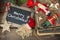 Christmas decoration candles and vintage toys. Chalkboard
