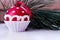 Christmas decoration, cupcake hanging on fir tree over green background, selective focus.Decoration New Year tree. The place for.