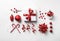 Christmas decoration, gift boxes with red ribbon, sparkles, confetti, christmas candy and balls on white background. Xmas