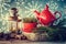 Christmas decoration: lantern, tea kettle and cup with spruce twigs