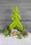 Christmas decoration with a lime green handmade tree, presents,