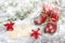 Christmas decoration red stars sweets baby shoes vintage bokeh
