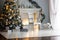 Christmas decoration - room with beautiful chair, fireplace and christmas tree