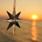 Christmas decoration star on the background of the sunset on the sea. Square