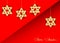 Christmas decoration with stars of wood, gold Merry Christmas, red background, greeting card