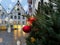 Christmas decoration Tallinn   in the city Red ball on green tree  spruce branch  blurred yellow evening light lamp life style  ur