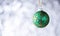 Christmas decoration or toy for Christmas tree with shimmering details, copy space. Decoration concept. Festive ornament