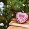 Christmas decoration tree red balls heart wooden texture