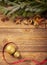 Christmas decoration, wooden background: ornaments, spices, christmas ball and ribbon