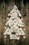 Christmas decoration: wooden carved tree decorated with gingerbread.