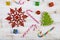 Christmas decoration on a wooden table. Snowflakes, gifts, cand