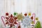 Christmas decoration on a wooden table. Snowflakes, gifts, cand