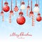 Christmas decorations with balls and lollipops on snowy