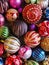 Christmas decorations. Beautiful red, golden, yellow balls with sparkles and stripes. Preparing for the New Year and