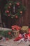 Christmas decorations at cozy wooden country house, outdoor setting on table