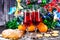 Christmas decorations on a dark wooden background, pastries, biscuits, tangerines, champagne wine in transparent glasses