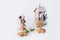Christmas decorations with a felt toy rap mouse, wooden house with soft warm light and gingerbread in the shape of a star. Chine