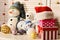 Christmas decorations in festive room. Snowmen and teddy bears,