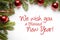 Christmas decorations with the greeting `We wish you a blessed new year!`