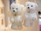 Christmas decorations in the shape of white teddy bears