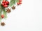 Christmas decorations on a white background, berries rose hips, stars, fir branches. copy space