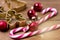 Christmas Decorations on Wooden Background Candy Cane Christmas Toys Holiday Festive Background or Card Horizontal Toned