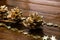 Christmas decorations on wooden board. Christmas pine cones