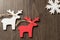 Christmas decorations, wooden Christmas toys,  deer , snowflakes on   table