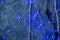 Christmas deep blue cracked background with blue highlights and garland,