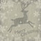 Christmas deer with snowflakes on wooden texture.