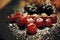 Christmas dessert / Cranberries and blackberries with sugar powder