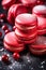 Christmas dessert idea, delicious red macarons on a platter, sweet xmas celebration gift