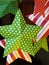 Christmas dimensional red, white, and green striped, dot, and chevron stars