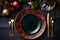 Christmas dinner meal table setting with a blank plate and Christmas decorations