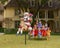 Christmas Display with Santa riding a reindeer and pulling a sleigh full of children in Dallas, Texas